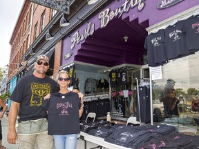 Dan and Shaena Rieckermann, owners of Pearl's Boutique on Main Street in Port Dover, had their tables of T-shirts out on Thursday afternoon, ready for an expected influx of thousands of bikers on Friday the 13th. Brian Thompson/Brantford Expositor