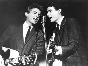 CP-Web.  FILE - In this July 31, 1964 file photo The Everly Brothers, Phil, left, and Don, perform on stage. Don Everly, one-half of the pioneering rock ‘n’ roll Everly Brothers whose harmonizing country rock hits impacted a generation of rock music, has died.  Don Everly was 84. A family spokesperson said Everly died at his home in Nashville, Tennessee on Saturday, Aug. 21, 2021. (AP Photo, File) ORG XMIT: e3ba3ca5a8be4548ac70e3e975df3350-2a18585ee7fb46c59e0326b8ce28ad82-0