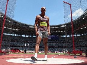 Damian Warner of Team Canada reacts while competing in the Men's Decathlon Discus Throw on day thirteen of the Tokyo 2020 Olympic Games at Olympic Stadium on August 05, 2021 in Tokyo, Japan.