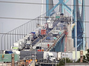 Trucks heading into Canada at the Ambassador Bridge in Windsor are shown backed up the length of the bridge. (Dan Janisse/Windsor Star file photo)