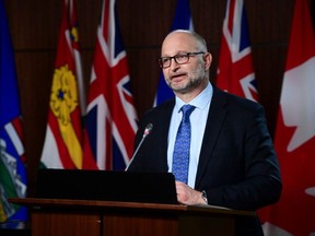 David Lametti, Minister of Justice and Attorney General of Canada, delivers a statement on Bill C-7 during a media availability on Parliament Hill in Ottawa Thursday, March 11, 2021.