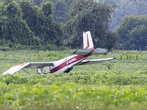 An airplane crashed near Tillsonburg Regional Airport in Tillsonburg, on Monday. The pilot was uninjured, police said. (Derek Ruttan/The London Free Press)