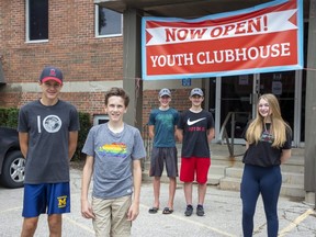 A new community hub and youth clubhouse has been opened in Thorndale. Some of the youth set to use it are (left to right) brothers Grant (15) and Kirk Hallman (13),  twin 13-year-olds Devan and Tyson Lucas, and Reesor Steele (14). Photo shot on Thursday, August 12, 2021. Derek Ruttan/The London Free Press