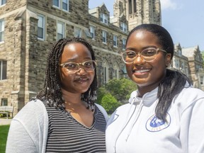 Birabwa Serumaga, left, and Jeanique Wilson of Brescia University College are youth mentors for high school students at WeBridge, a new non-profit group that aims to bridge the gap in services for Black people in London. (Mike Hensen/The London Free Press)