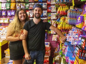 Nikita and Andrew Ariganello have opened Sweet Life Candy and Pop Shop on Charterhouse Crescent in London. (Mike Hensen/The London Free Press)