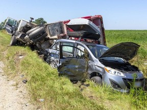 A garbage truck and minivan collided at Kerwood Road and Egremont Drive, near Strathroy, at about 10:30 a.m. on Thursday Aug. 19, 2021. Five people, all in the minivan, were hurt. Mike Hensen/The London Free Press