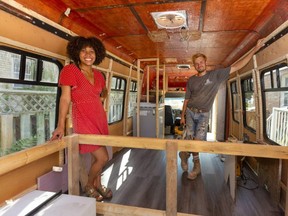 Bobbi Jo Brown and Riley Zimmer have big plans for the shuttle bus that they're transforming into a tiny home on wheels in London. (Mike Hensen/The London Free Press)