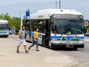 The bus depot at Masonville mall handles scores of shoppers and workers heading into the shopping centre in north London. (Mike Hensen/The London Free Press)