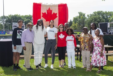 Miranda Ayim and her family are joined by the McAuley family during the city celebrations for returning Olympians held in Labatt Park on Saturday August 28, 2021. 
Mike Hensen/The London Free Press/Postmedia Network