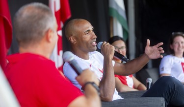 Damian Warner, gold medalist in decathlon at the Tokyo Olympics, talks to emcee Mike Stubbs about training in Farquharson arena. He was at the city's celebrations for London's Summer Olympic stars, held in Labatt Park on Saturday August 28, 2021. Mike Hensen/The London Free Press/Postmedia Network