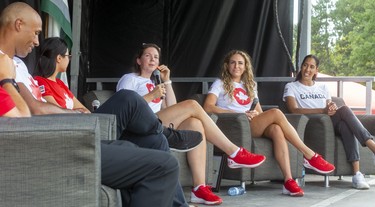 London gold-medal rower Susanne Grainger talks about her time at the Tokyo Olympics as the city celebrated its Summer Olympics stars in Labatt Park on Saturday August 28, 2021. Left to right are Olympians Damian Warner, Maggie Mac Neil, Grainger, Jen Martins and Miranda Ayim. (Mike Hensen/The London Free Press/Postmedia Network)