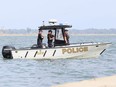 Members of the OPP underwater search and recovery unit head to Lake Erie out of South Side Landing Marina andRV Park in Erieau, Ont., on Sunday, Aug. 8, 2021. (Mark Malone/Postmedia Network)