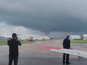 This image, posted to social media Tuesday afternoon, shows what appears to be a funnel cloud near London International Airport. Image published Tuesday Aug. 10, 2021. Twitter/@planechuter