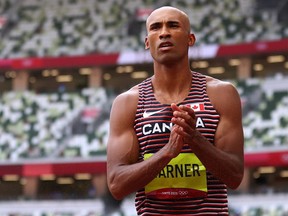 Damian Warner of London is on solid footing at the end of Day 1 in the Olympic decathlon. He leads with 4,722 points.