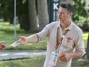 Kevin Kruchkywich, the federal NDP candidate for Perth-Wellington, hands out campaign material on Wednesday, Sept. 8, near Stratford General Hospital in Stratford, Ont. (Cory Smith/Postmedia Network)