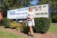 Dawn Ruddick, principal of Lord Elgin public school in London, Ont., stands outside the elementary school on Sept. 29, 2021, the first day of a weeklong closure driven by nearly a dozen student cases of COVID-19. (MEGAN STACEY/The London Free Press)