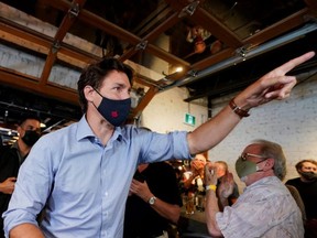 Prime Minister Justin Trudeau gestures during an election campaign stop in Brantford, Ont. Sept. 6, 2021.