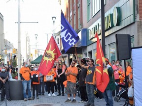 Hundreds of Londoners gather Thursday evening on Dundas Place for the Turtle Island Healing Walk. The event to mark the National Day for Truth and Reconciliation included speeches and a pop-up market. (CALVI LEON, The London Free Press)
