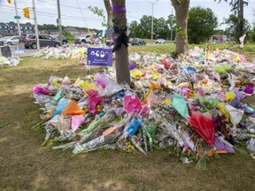 London police said a section of Hyde Park Road will be closed Sunday to allow investigators to get a "photographic scan" of the intersection of Hyde Park and South Carriage roads. The scan is part of the investigation into a hit-and-run crash June 6 that killed four members of the Afzaal family and injured a fifth. A memorial to the London Muslim family is shown in this file photo. (Derek Ruttan/The London Free Press file photo)