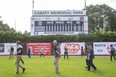 Several people enjoy a tour of Labatt Park in London on July 22. The oldest continuously used 
baseball grounds in the world is a new inductee into the London Sports Hall of Fame. (Derek Ruttan/The London Free Press)