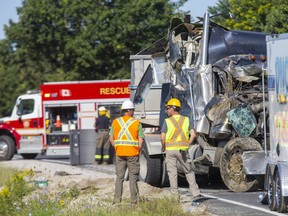 Two people were injured in a collision between a transport truck and a van on Highway 3 east of St. Thomas on Thursday. The 7:30 a.m. crash caused the closure of the highway between Quaker Road and Yarmouth Centre Road for several hours. (Derek Ruttan/The London Free Press)