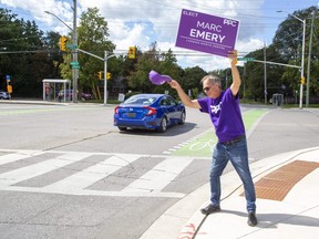 PPC candidate Marc Emery, who tweeted this week that Liberal Leader Justin Trudeau deserved a fate like executed Italian dictator Benito Mussolini, campaigns at Cheapside and Adelaide streets Wednesday. (DEREK RUTTAN, The London Free Press)