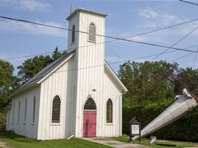 A Sunday night storm tore the steeple off of the 125-year-old Trinity Chapel in Ailsa Craig, a community 40 kilometres northwest of London. The defunct chapel is owned by the North Middlesex Historical Society. (Derek Ruttan/The London Free Press)