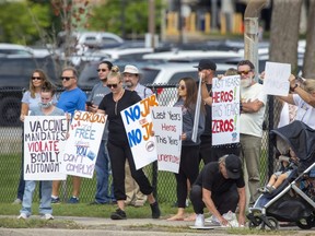 About 200 people anti-vaccine and anti-lockdown protesters demonstrate outside London's Victoria Hospital as part of what organizers called a "national health freedom movement" on Monday, Sept. 13. (Derek Ruttan/The London Free Press)