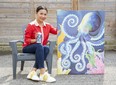 Artist Arale Vallely's painting titled "Octopus" decorates a can of beer at London Brewing Co-op in London. (Derek Ruttan/The London Free Press)