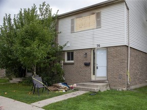 A firefighter suffered minor injuries while battling a $100,000 townhome blaze at 1600 Culver Dr. in east London late Monday, London fire officials say. (Derek Ruttan/The London Free Press)