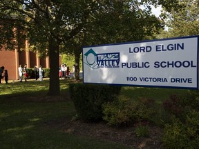 People line up for a pop-up COVID-19 assessment centre at Lord Elgin public school at 1100 Victoria Dr. in London on Wednesday Sept. 29, 2021. The school has been closed since Sept. 29 following a COVID-19 outbreak. It was supposed to reopen Tuesday but that has been pushed back to Oct. 12 because more cases have been reported. Derek Ruttan/The London Free Press