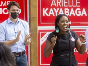 Arielle Kayabaga, the Liberal candidate for London West, introduces Prime Minister Justin Trudeau with Peter Fragiskatos, right, during a campaign stop at Storm Stayed Brewing Co. in London last Friday. Kayabaga won the hotly contested riding in Monday's election.  
(Mike Hensen/The London Free Press)