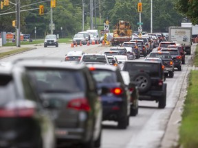 Repairs to a traffic light at Wonderland and  Springbank, which block the left turn lane, have left Wonderland jammed with traffic southbound in London, Ont. (Mike Hensen/The London Free Press)