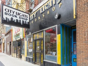 Jim Capel and Teresa Tarasewicz, who co-own City Lights Bookshop on Richmond Street, are selling the business and the building. The used book store opened in 1975. (Mike Hensen/The London Free Press)