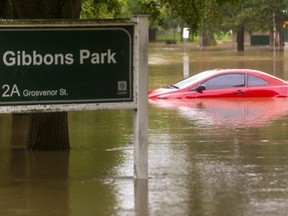 Flooding in Gibbons Park caught one car owner unaware as heavy rainfall drenched the community. Photo taken on Thursday Sept. 23, 2021. (MIKE HENSEN, The London Free Press)