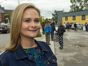 Jennifer Martino, executive director of the Crouch Neighbourhood Resource Centre,  welcomes the Bifana Boys food truck to serve area kids and families Thursday as part of United Way Elgin Middlesex's 3M Harvest Lunch 2021 fundaising campign kickoff. (Mike Hensen/The London Free Press)