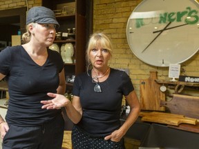 Cathy Walsh, right, owner of Nooner's restaurant, said it's unfair to make restaurants police the new vaccine certification system while anyone can walk into a Canadian Tire. Her daughter Katrina Wice, the manager, said they've decided to stick to takeout, which is 90 per cent of their current business on Clarence Street in London. (Mike Hensen/The London Free Press)