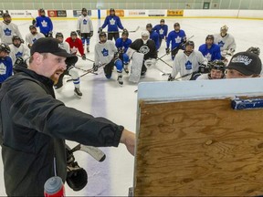 London Nationals head coach Colin Martin and assistant coach Jeff Bradley instruct players at a practice Sept. 23, 2021, at the Western Fair Sports Centre. They have both left the first-place team as of early January 2022. (Mike Hensen/The London Free Press)