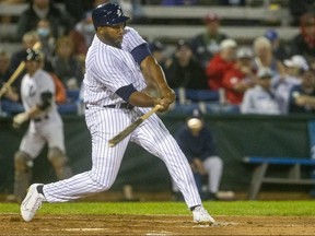 Cleveland Brownlee hits a double to drive in two runs for the London Majors in Game 3 of the Intercounty Baseball League championship series with the Toronto Maple Leafs. (Mike Hensen, The London Free Press)