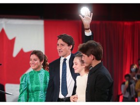 Justin Trudeau, accompanied by his wife Sophie Grégoire Trudeau and two of their children, Ella-Grace and Xavier, celebrates at the Liberal election night party in Montreal on Monday. Now comes the hard part.