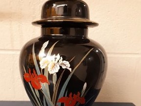 This urn, believed to contain cremated remains, was found Saturday outside of a business on Confederation Street in Sarnia. Police are seeking its owner. (Sarnia police)