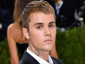 Canadian singer Justin Bieber arrives for the 2021 Met Gala at the Metropolitan Museum of Art on Sept. 13, 2021 in New York.