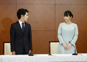 Amid public furor over her plans to marry a commoner,  Japan's Princess Mako, right, have up her royal title to marry her college sweetheart, Kei Komuro, in a civil   ceremony this week. (Getty Images)