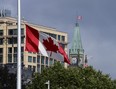 Canada flags continue to fly at half-mast in Ottawa on Monday, June 28, 2021. (THE CANADIAN PRESS/Sean Kilpatrick)