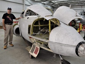 Jet Aircraft Museum events coordinator Darryl Smith shows off the progress on the Tutor jet restoration. The multi-year project to get the plane restored to flying condition is expected to cost $200,000.