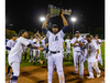 Slugger Cleveland Brownlee holds the Dominico Cup as the London Majors celebrate their first Intercounty Baseball League title since 1975 after an 8-4 Game 5 win Oct. 1, 2021, over the Toronto Maple Leafs at Labatt Park.