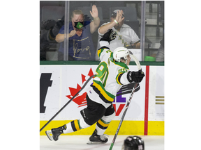 London Knights forward Landon Sim celebrates, and so do the back-at-the-rink fans, after scoring in the second period of their OHL game against the Owen Sound Attack at Budweiser Gardens in London on Friday October 8, 2021.Derek Ruttan/The London Free Press