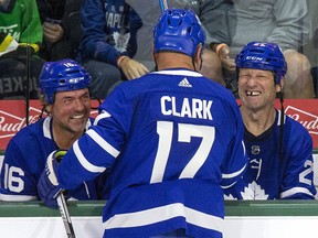 Wendel Clark says something to crack up Darcy Tucker (left) and Shayne Corson during the Toronto Maple Leafs alumni game at Budweiser Gardens in London on Sunday October 3, 2021. Derek Ruttan/The London Free Press