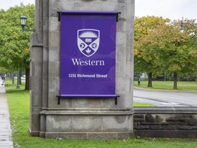 Western University main gates on  Richmond Street at University Drive in London, Ont. on Thursday, Oct. 21, 2021. Police have charged a London man with criminal harassment after three women were followed near the Richmond Street and University Drive intersection. (Derek Ruttan/The London Free Press)