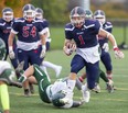 Liam Talbot of the St. Andre Bessette Bulldogs charges up field in a game Thursday against the Mother Teresa Spartans at City Wide Sports Park in London. The Bulldogs won 37-0. (Derek Ruttan/The London Free Press)